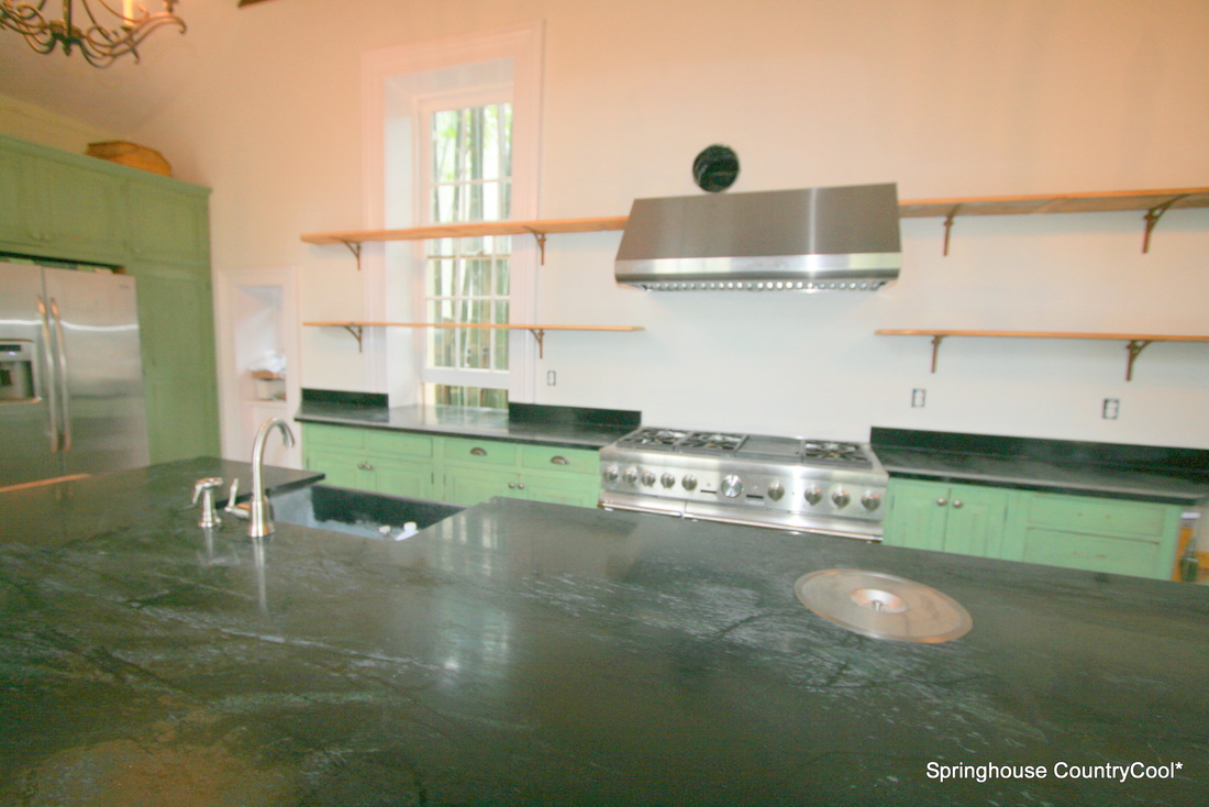 springhouse soapstone island and kitchen with reclaimed pine and cypress